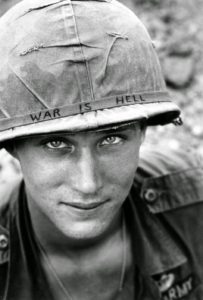 an-american-soldier-wears-a-hand-lettered-war-is-hell-slogan-on-his-helmet-vietnam-1965